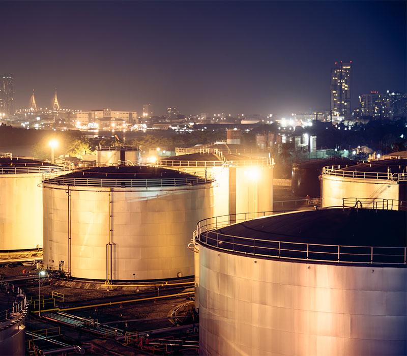 Oil tank storage at night